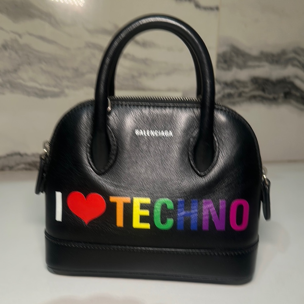Balenciaga Black and Red Satchel with Bold Text Design